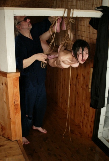 Bound Japanese slave girl Ageha Asagi endures a brutal water play session